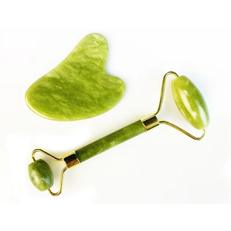 Natural jade roller and Gua Sha stone set for facial massage, anti-wrinkle skincare tool.